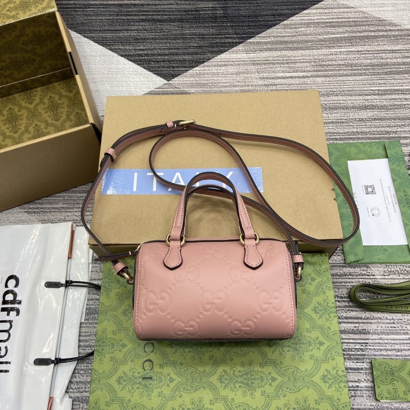 G*u*i top handle bags